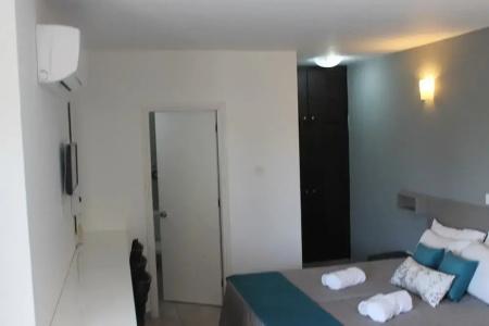 A. Maos Apartments - 69