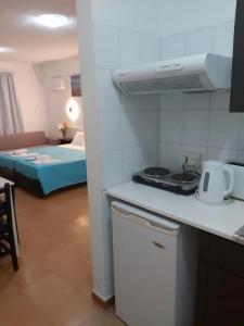 A. Maos Apartments - 27