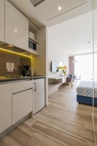 Romana Beach Apartments - 105