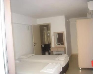 A. Maos Apartments - 104