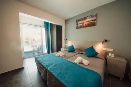 A. Maos Apartments - 122