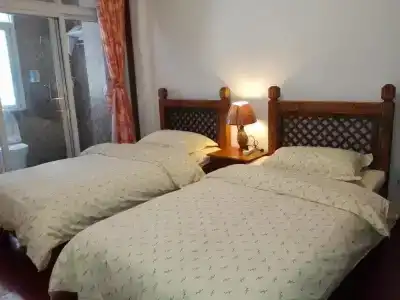 Mama Naxi Guesthouse - 4