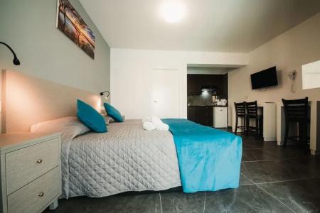 A. Maos Apartments - 60