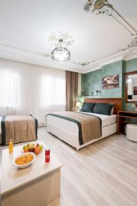 Atam & Suites - 129