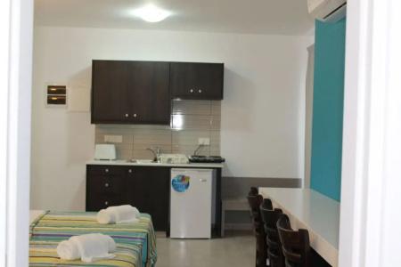 A. Maos Apartments - 123
