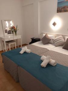 A. Maos Apartments - 86
