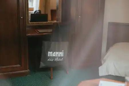 MANNI The - 57
