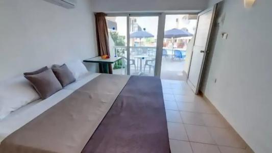 A. Maos Apartments - 121