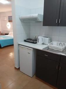 A. Maos Apartments - 22
