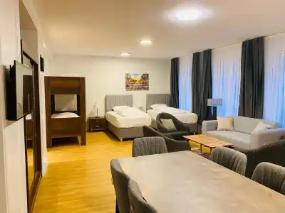 Akomo Bern - 2