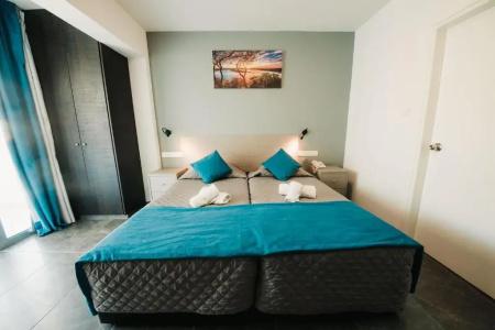 A. Maos Apartments - 128