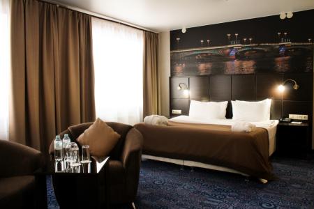 Охтинская - 115