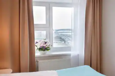 Охтинская - 107