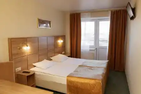 Охтинская - 105