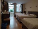 Standard Quadruple room with balcony and with city view