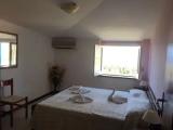 Economy Quadruple room with partial sea view