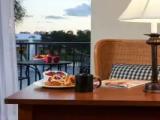 Deluxe Quadruple room with balcony and with city view