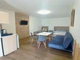 Standard Triple room with garden view