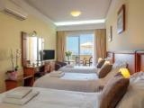 Superior Triple room with balcony and with partial sea view