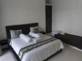 Standard Triple room with courtyard view