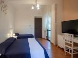 Standard Triple room with garden view