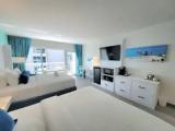 Standard Quadruple room with balcony and with pool view