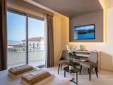 Superior room with balcony and with partial sea view