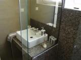 Standard Triple room with garden view