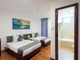 Deluxe Quadruple room with city view