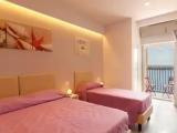 Standard Quadruple room with balcony and with sea view