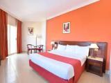 Standard Triple room with garden view