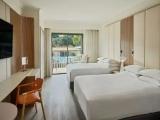 Deluxe Quadruple room with balcony and with pool view