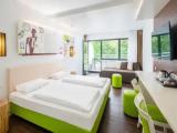 Standard Triple room with garden view