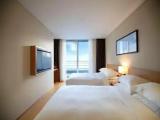 Standard Quadruple room with partial ocean view