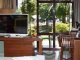 Standard Quadruple room with garden view
