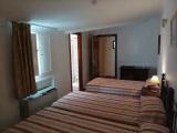 Standard Triple room with courtyard view