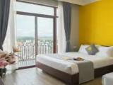 Deluxe Quadruple room with balcony