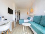 Standard Triple room with balcony and with partial sea view