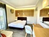 Classic Triple room with balcony and with garden view