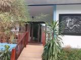Bungalow with balcony and with garden view