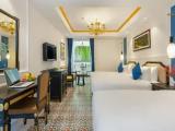 Deluxe Triple room with balcony and with pool view