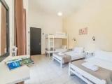 Standard Quadruple Family room with balcony and with garden view