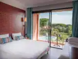 Standard Triple room with garden view
