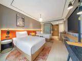 Deluxe Quadruple room with balcony