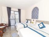 Deluxe Quadruple room with balcony