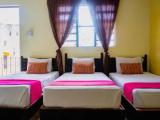 Standard Triple room with garden view