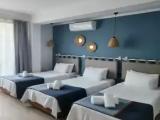 Standard Triple room with garden view