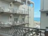 Standard Quadruple room with balcony and with partial sea view