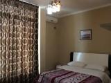 Standard Quadruple room with balcony and with partial sea view