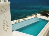 Villa with balcony and with water view